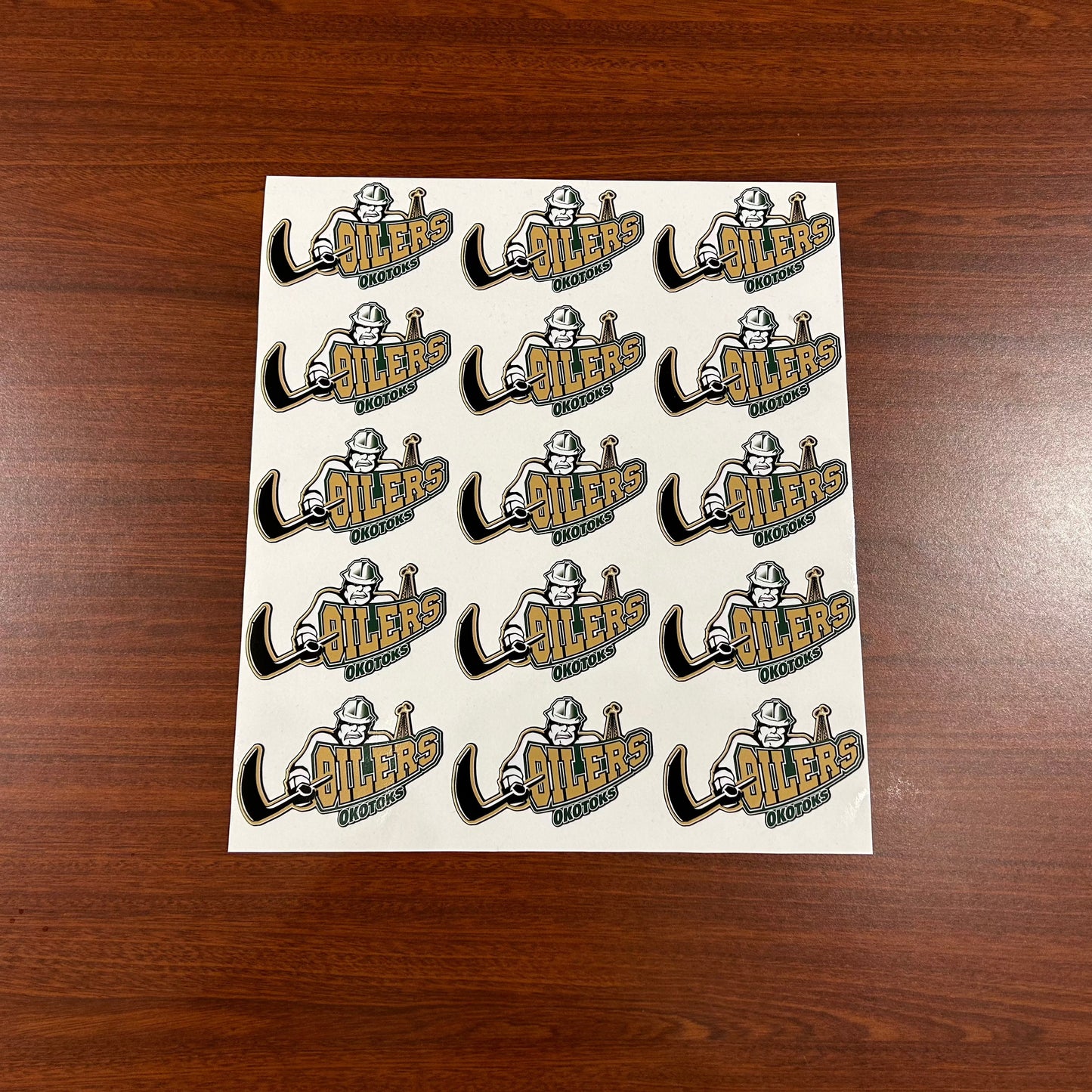 A sheet of Okotoks Oilers logo stickers.